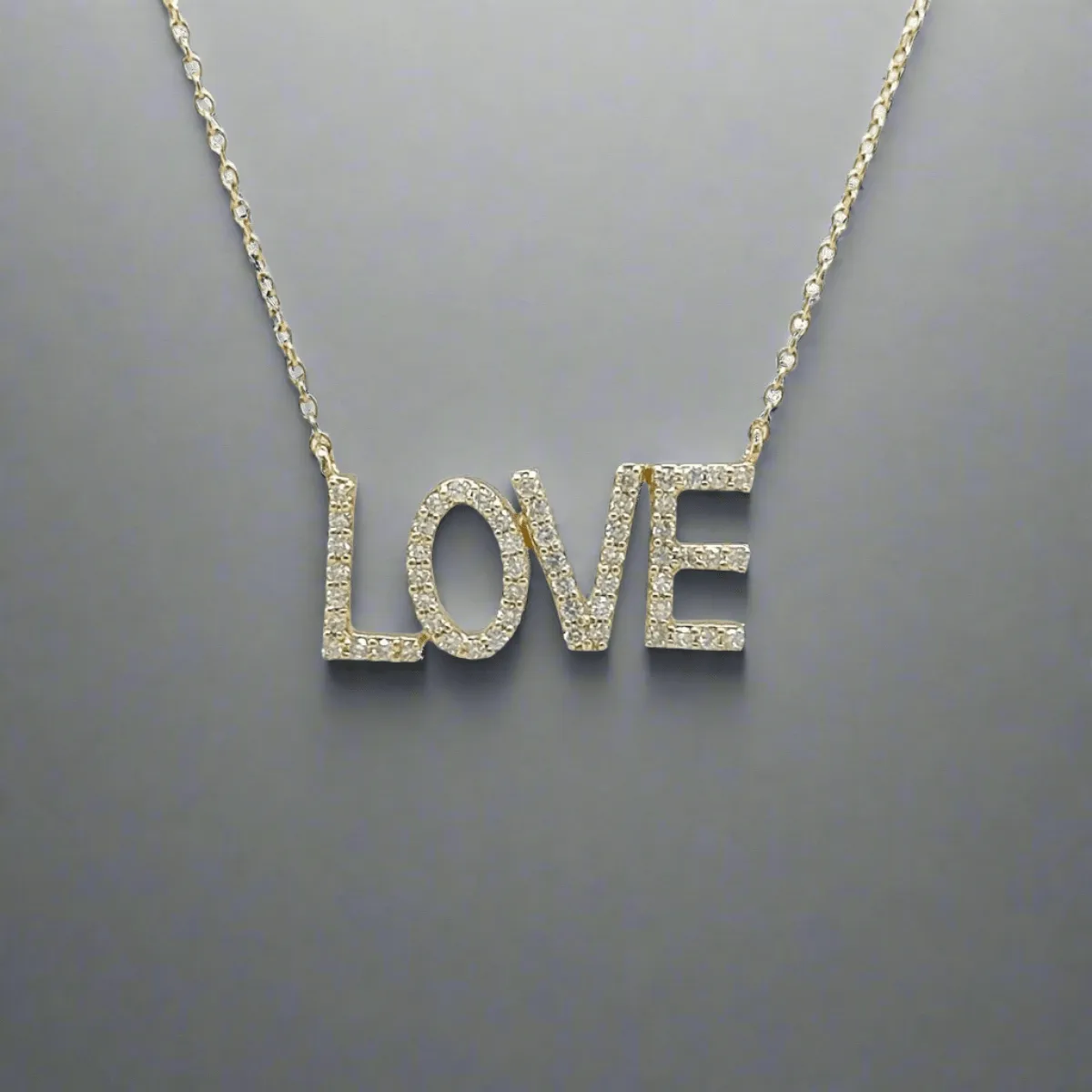 14K Y Gold 'LOVE' 0.22ctw H/SI2 Diamond Pendant